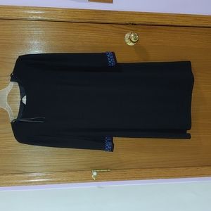Black dress with detail on sleeve